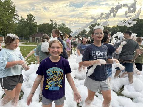 Campers covered in foam at 4-H Camp